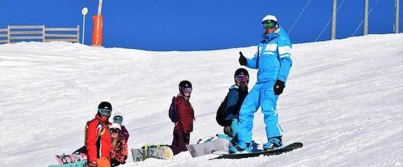 Snowboarding Lessons (from 7 y.) for All Levels from Ski School 360 Les Gets