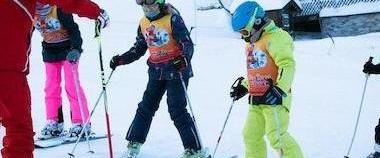 Kids Ski Lessons (5-12 y.) for Beginners from Ski School Stuben