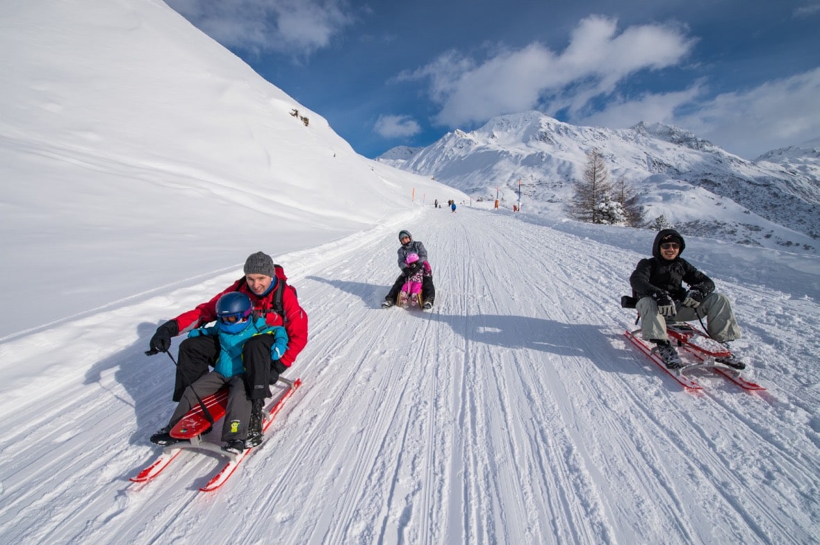 Andermatt_tobogganing_on_blue_runs © Andermatt Tourism
