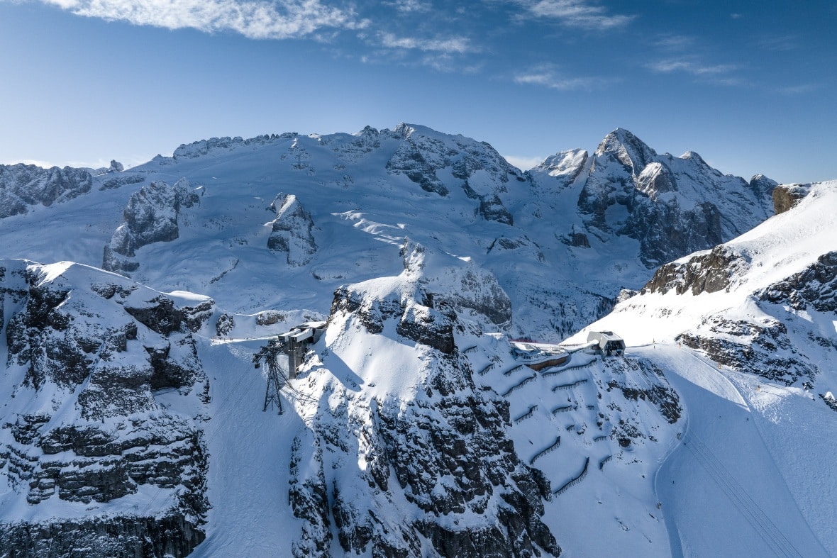 Top of the Porta Vescovo ski area above Arabba with Marmolada glacier behind