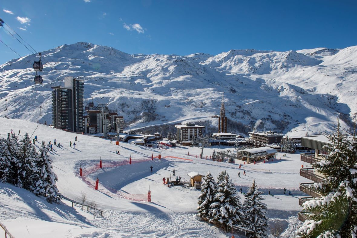 La Croisette in the centre of Les Menuires surrounded by ski lifts and ski slopes