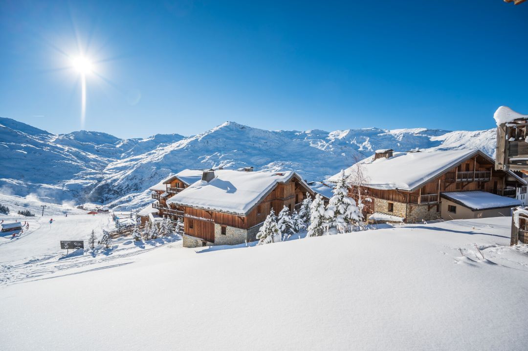 Snowcovered chalets in Reberty on the edge of Les Menuires