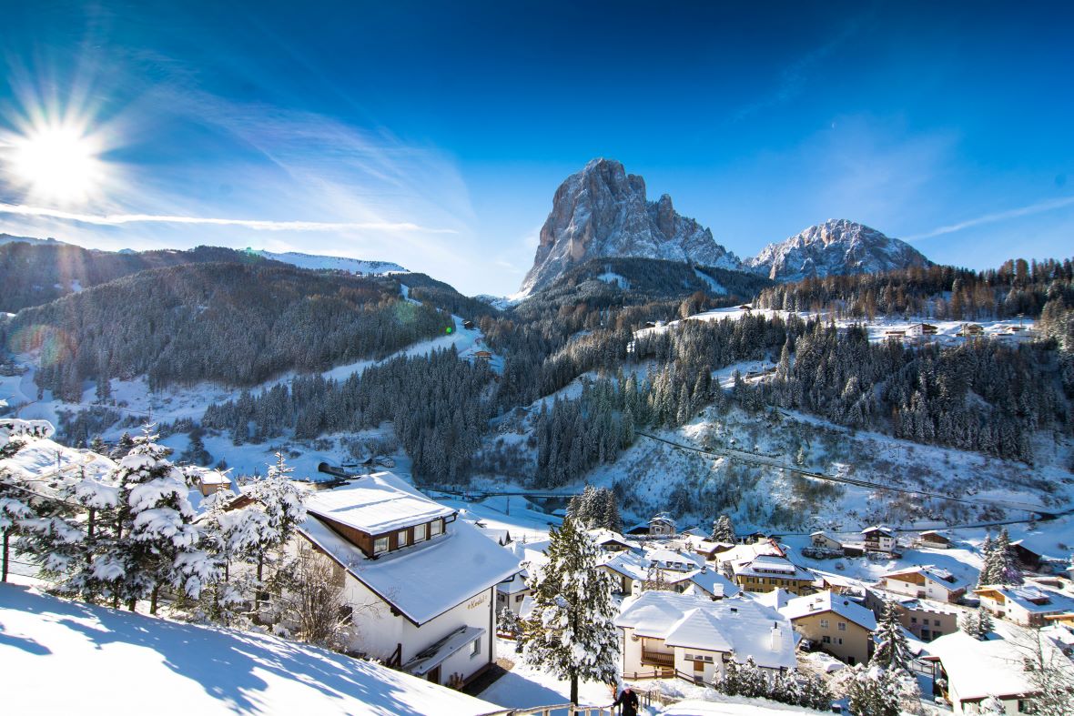 Santa Cristina in Val Gardena in winter surrounded by snowy Dolomite mountains