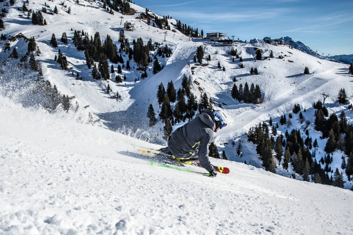 St Anton Skier on Gampen and view of Galzig