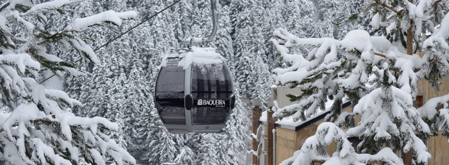 Baqueira ski gondola in trees